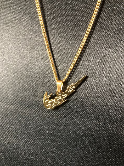 nike ketting goud|Nike ketting .